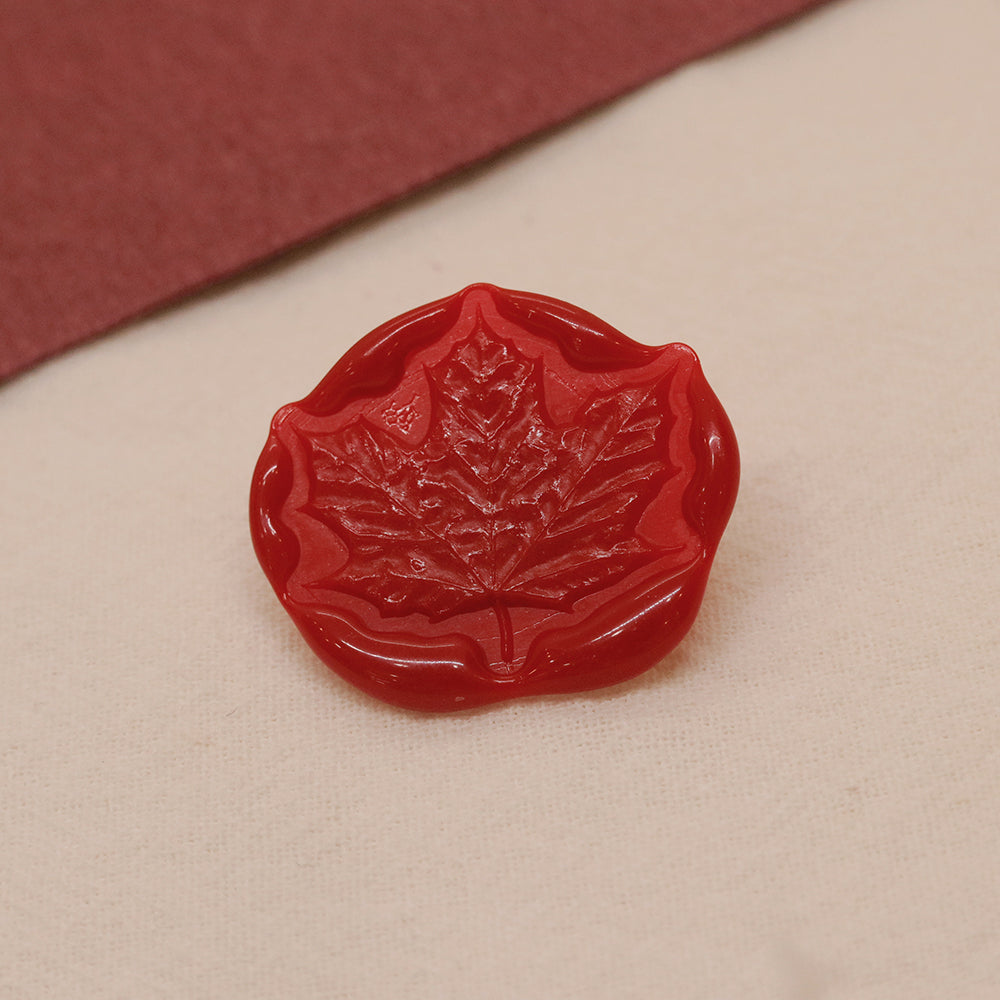 A 3D maple leaf wax seal stamp from AMZ Deco