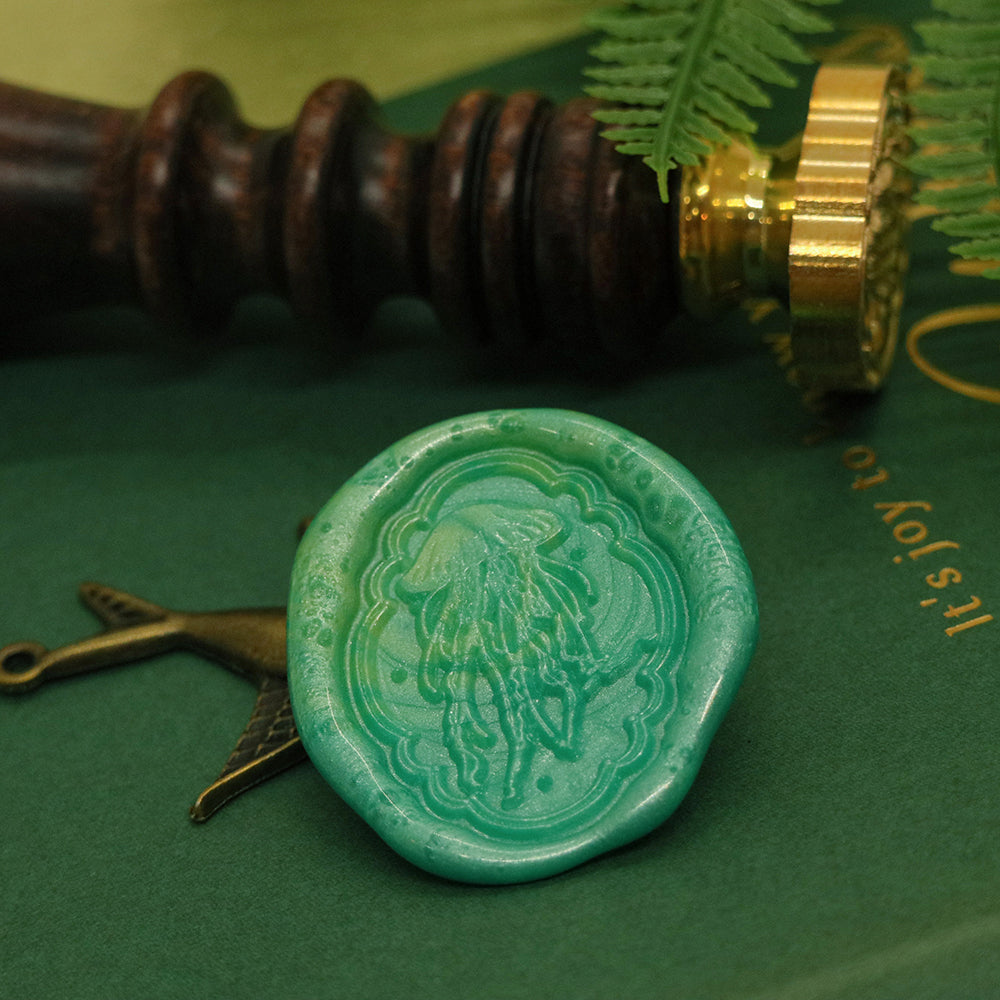 A contour cut jellyfish wax stamp from AMZ Deco.