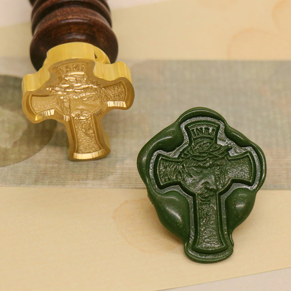 A cross shaped crucifix wax seal stamp from AMZ Deco.